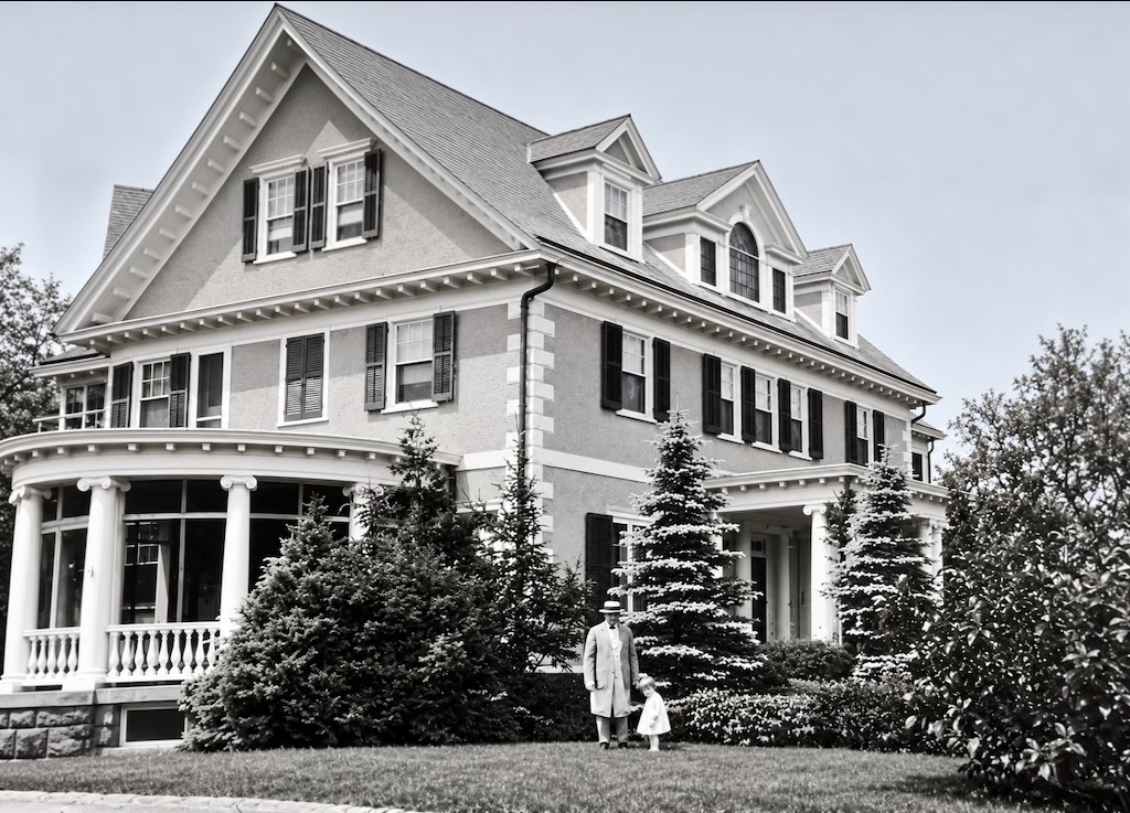 Suffern estate house with father and child.